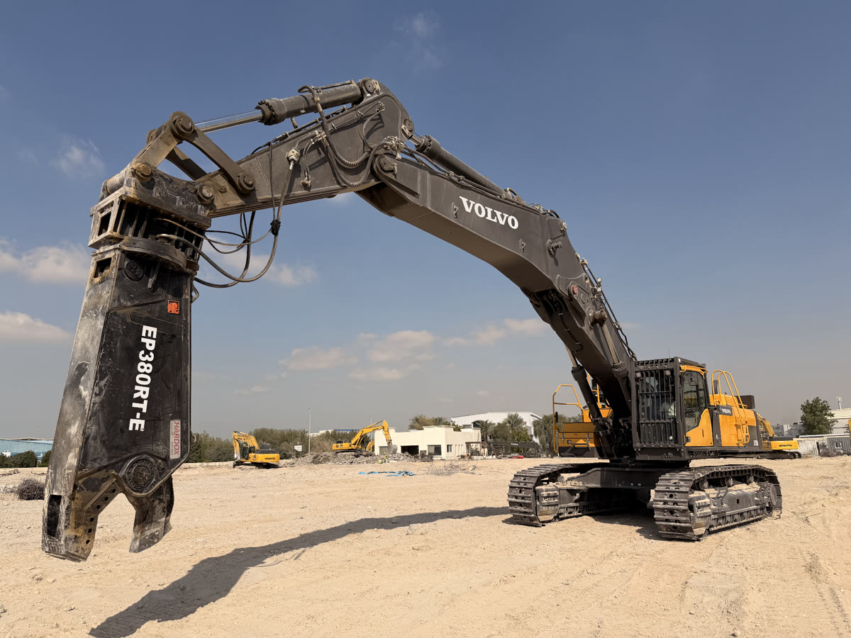 Heavy Volvo excavator with crusher attachment - USF Demolition Works equipment